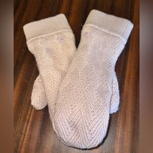 Lululemon soft mittens with finger opening. Never worn, no tag.